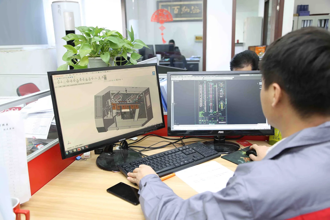 Boevan engineer running 3D technical design of a pouch packaging line